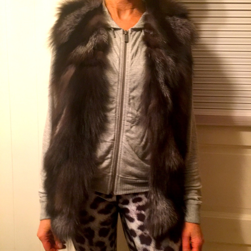 Fox vest with  fur in front with partial knit in back with 2 front hook closures